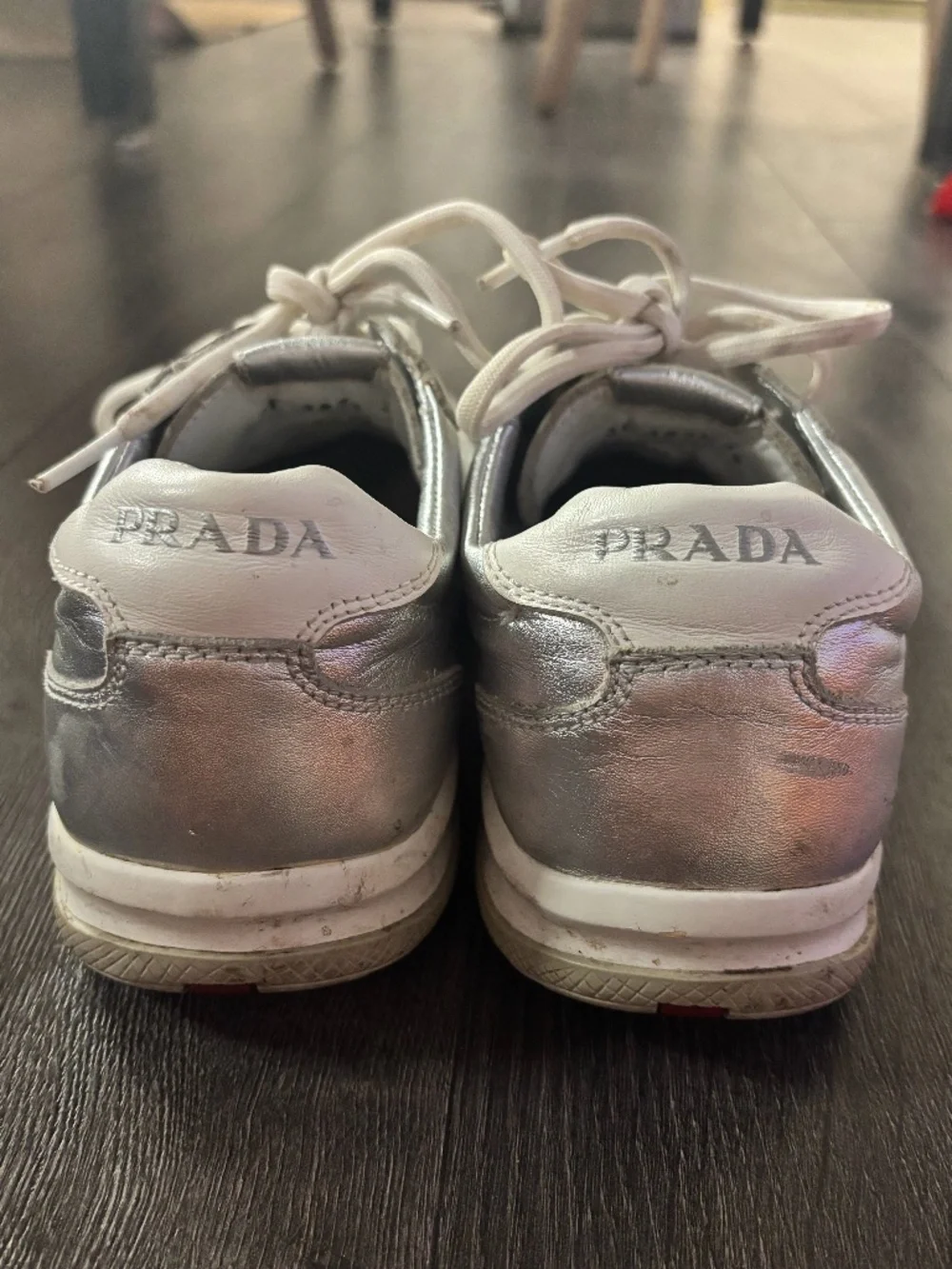 Prada Linea Rossa sneakers in metallic silver leather